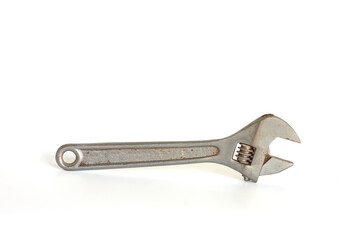 Old rusted adjustable spanner isolated on white background included clipping path.
