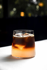 Espresso tonic in a lowball rocks glass