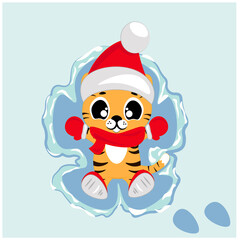 A cute tiger cub in a hat, mittens, a scarf and boots made a snow angel in winter