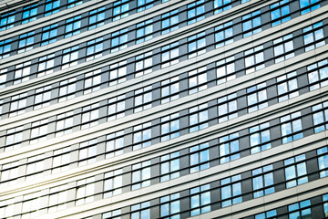 Round modern glass office building - business concept