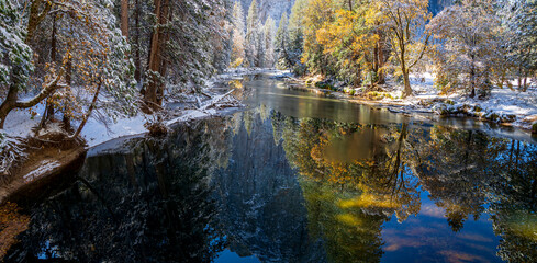 Merced River. Autumn first snow in Yosemite National Park, California, USA.