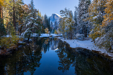 Merced River. Sentinel Bridge. Autumn first snow in Yosemite National Park, California, USA.