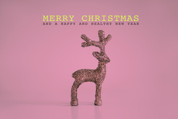 Hirsch, Hintergrund rosa, Schriftzug: Merry Christmas and a happy and healthy new year