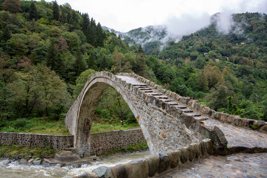 old stone bridge over the river