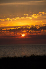 beautiful sunset at the beach in north corfu island greece