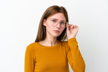 Young English woman isolated on white background With glasses and frustrated expression