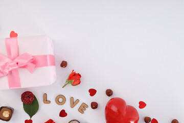 Flat lay composition with Valentine day accessories on white background