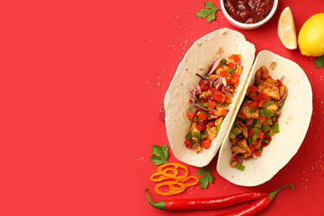 Concept of tasty food with taco on red background