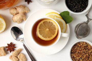 Concept of hot drink with tea on white background