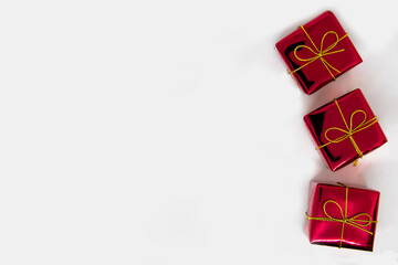 Christmas holiday concept. red gift box on white background with copy space