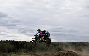 Fototapeta na wymiar motocross rider on a motorcycle