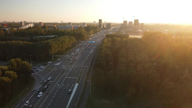Amsterdan north intersection between N247 and the A10 Ringweg north, the highway where evening rush hour traffic stands on the highway. Commuters going home.