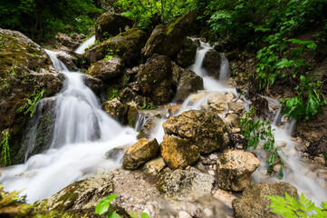 Fototapeta premium Waterfall in Cherek gorge in the Caucasus mountains in Russia