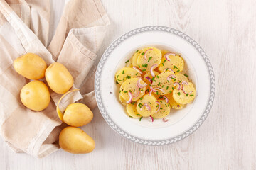 New potato salad with red onion and chive from above.