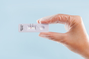 Medical doctor with Covid test.