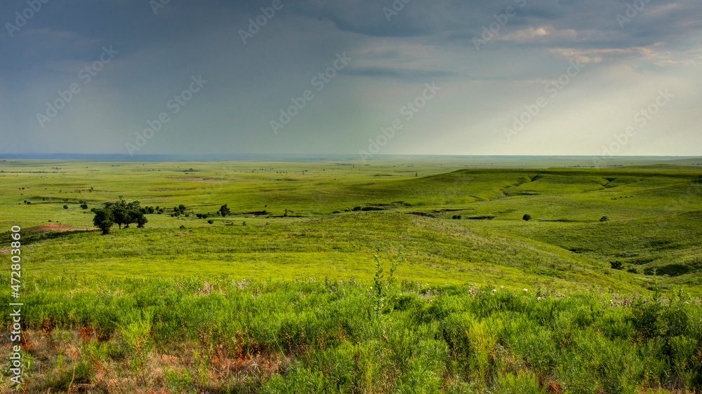 Sticker Rain shafts in the distance indicating it may not be long before it arrives at our location.