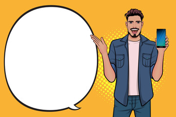 Smiling bearded man holding smartphone present something with speech bubble