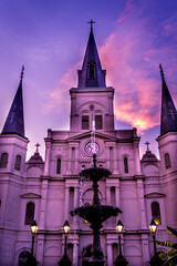 Sunset Fountain Saint Louis Basilica Cathedral Oldest Cathedral facade, New Orleans, Louisiana. Built 1718 King Louis France. - obrazy, fototapety, plakaty