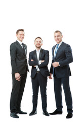 Successful business team. Full length of group of confident businessmen in formal wear standing close to each other. Isolated on white.