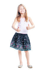 The best! Cute little girl showing thumbs up. Isolated on white.