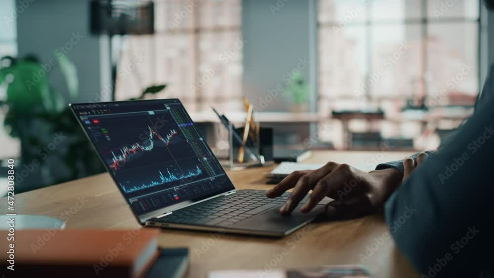 Aufkleber Home Office: Anonymous Financial Analyst Using Computer with Display Showing Stock Market Charts, Data. Remote Working African American Trader Making e-Commerce Investment. Camera Focus on Hands