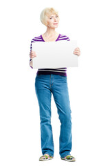 Your advertisement in good hands. Attractive middle aged woman holding empty blank with copy space. Isolated on white.