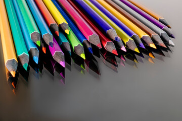 Colored pencils close up. Macro shooting. A tool for drawing and creativity for children and adults. Drawing with colored pencils.