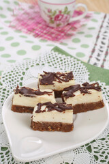 Cake with biscuits, chocolate and cream