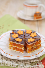 Homemade waffle dessert with chocolate, biscuits and nuts