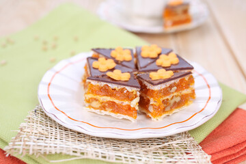 Homemade waffle dessert with chocolate, biscuits and nuts