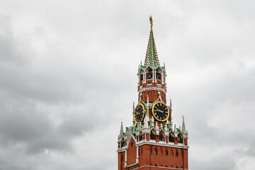 Kremlin tower against heavy gray clouds. Moscow, Russia.