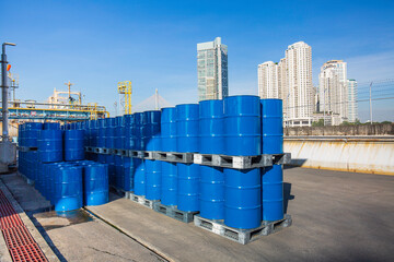 Oil barrels blue or chemical drums vertical stacked up