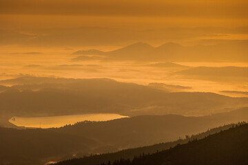 Summer views in the Karkonosze Mountains during the August sunrise. Hiking in the National Park.