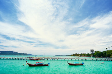 Fototapeta na wymiar Travel by Thailand. Beautiful summer landscape with tropical sea marina lagoon and pier.