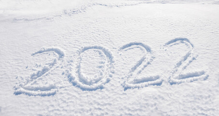 New year 2022, handwritten in snow