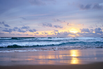 Fototapeta na wymiar Stormy weather. Beautiful seascape with cloudy sky. Sunset on the beach.