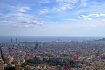 Obraz premium Barcelona aerial view, cityscape and horizon. La Sagrada Familia and sea, city architecture. Panoramic view