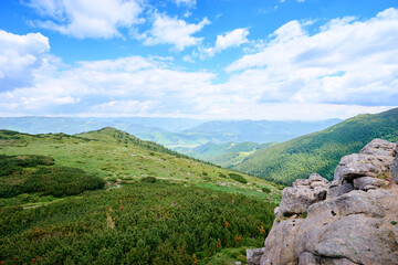 Fototapeta na wymiar Beautiful mountains landscape with green meadow. Carpathians, Ukraine.