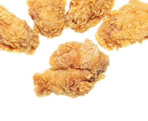 Fried chicken meat in batter isolated on a white