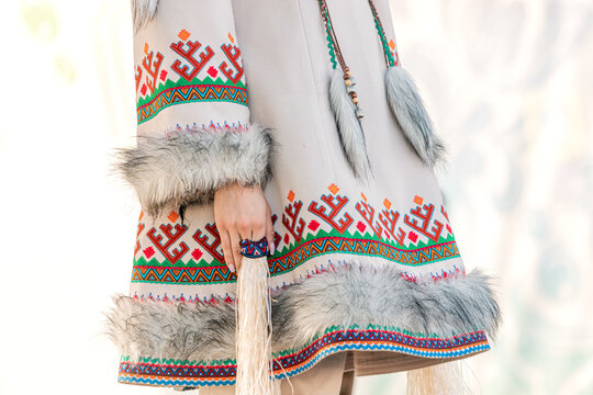 Traditional clothing of the indigenous peoples of the north. Coat richly decorated with deer fur and national patterns