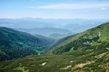 Naklejka premium Beautiful mountains landscape with green meadow. Carpathians, Ukraine.