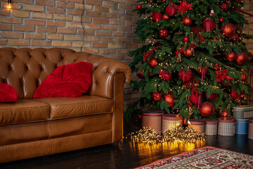 Interior with New Year's d cor in loft style. Christmas living room with a fireplace, sofa, Christmas tree and gifts. Beautiful New Year decorated classic home interior.