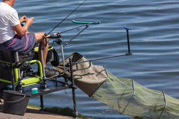A man fishing with a rod