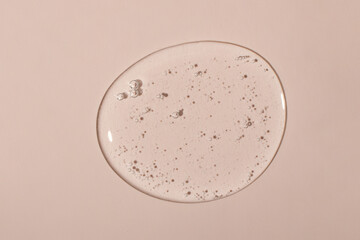 Macro photography of the cosmetic gel on pastel background.Bubbly structure.