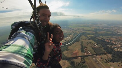 Sky dive selfie couple at the skies