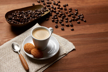 A cup of coffee on a wooden table