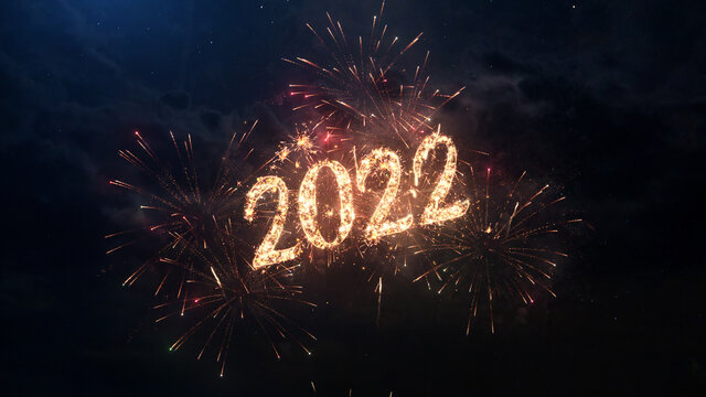 2022 Happy New Year greeting text with particles and sparks on black night sky with colored fireworks on background, beautiful typography magic design.