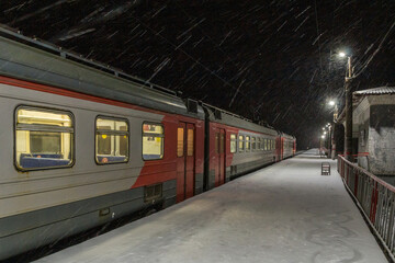 Fototapeta na wymiar Snowstorm over the train station