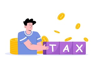 A man arrange cubes with word TAX and some money