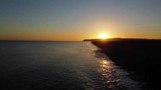 Sunset over sea and beach